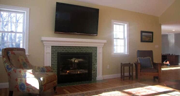 living room, tv, and fireplace